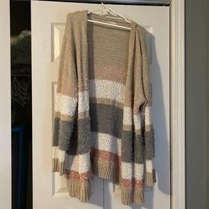 Beautiful and soft cardigan with gorgeous muted tans, pinks and grays.
